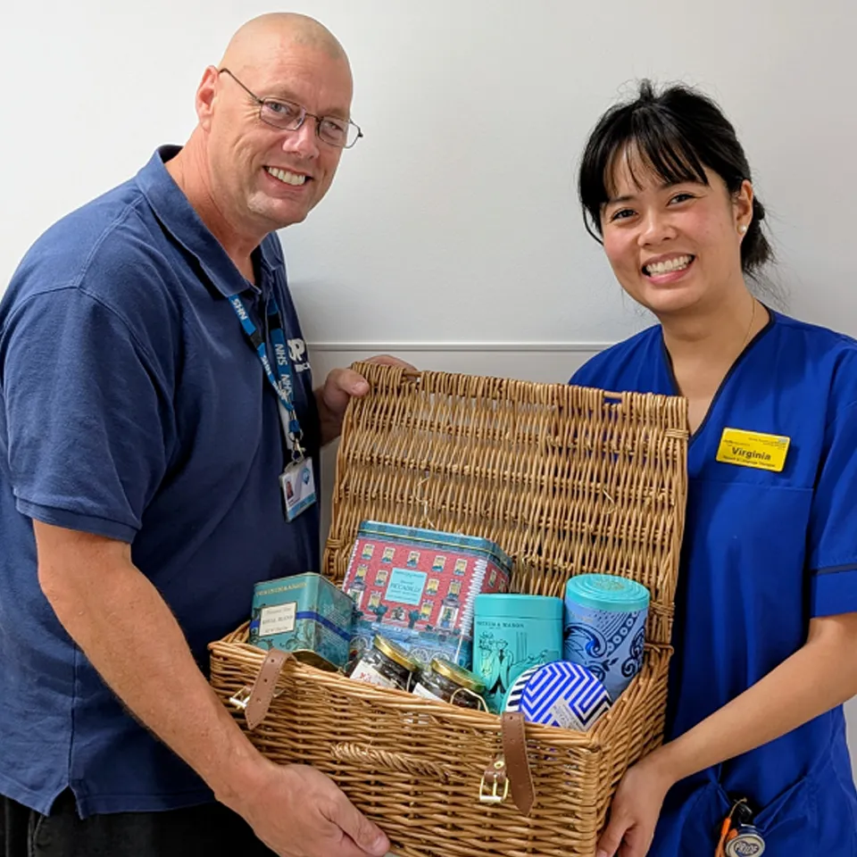 Customer survey winner presented with prize